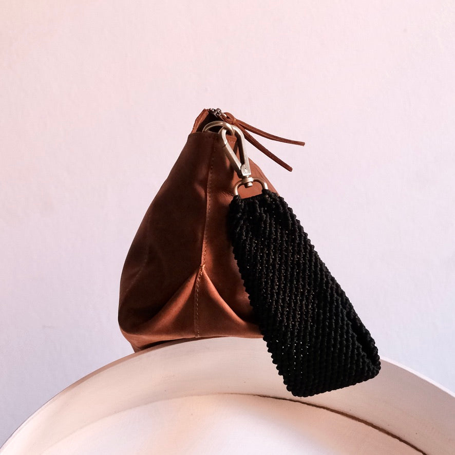 side angle of ogda shoulder bag in cognac leather