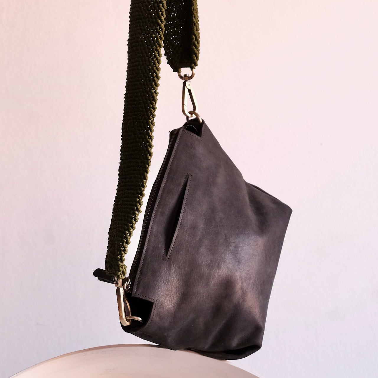 close up of black leather ogda shoulder bag