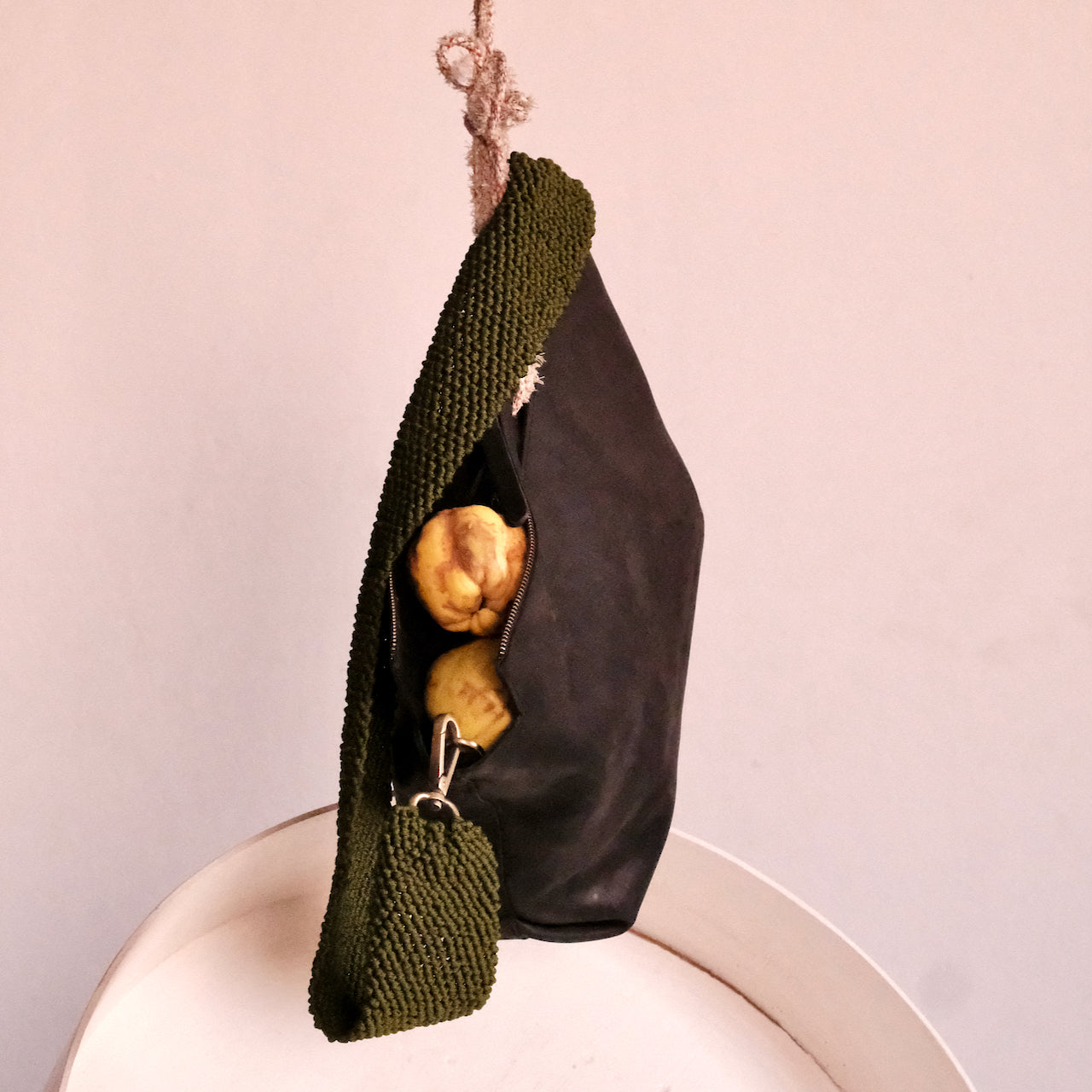 handmade black leather shoulder bag wit green macrame strap